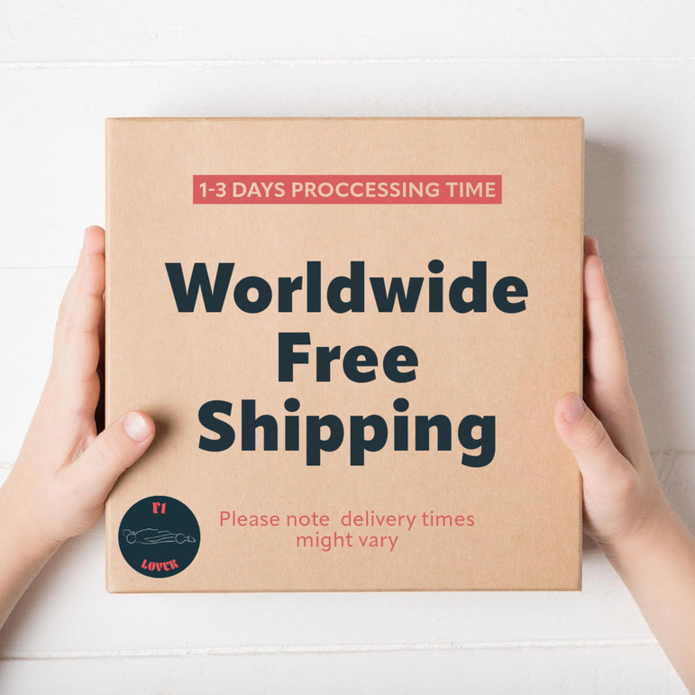 Cardboard box with 'Worldwide Free Shipping' text held by hands on a white background