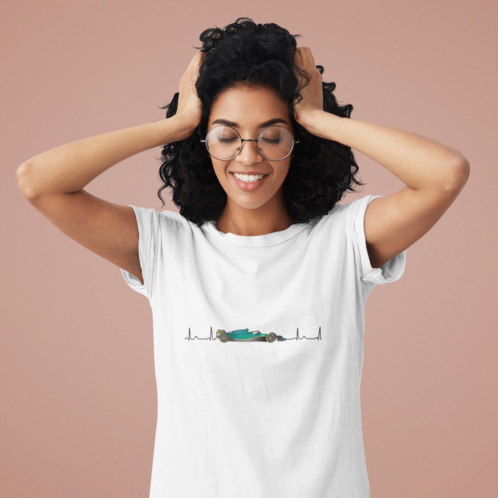 Woman wearing a white t-shirt with a graphic design on a beige background