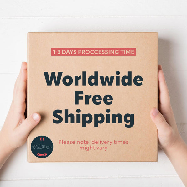 A brown cardboard box with the text '1-3 DAYS PROCESSING TIME', 'Worldwide Free Shipping', and 'Please note delivery times might vary'. The box has a small sticker with the text 'FI LOVER'.